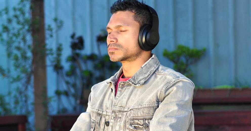 Meditate in headphones on our weekly sit at Sharpham