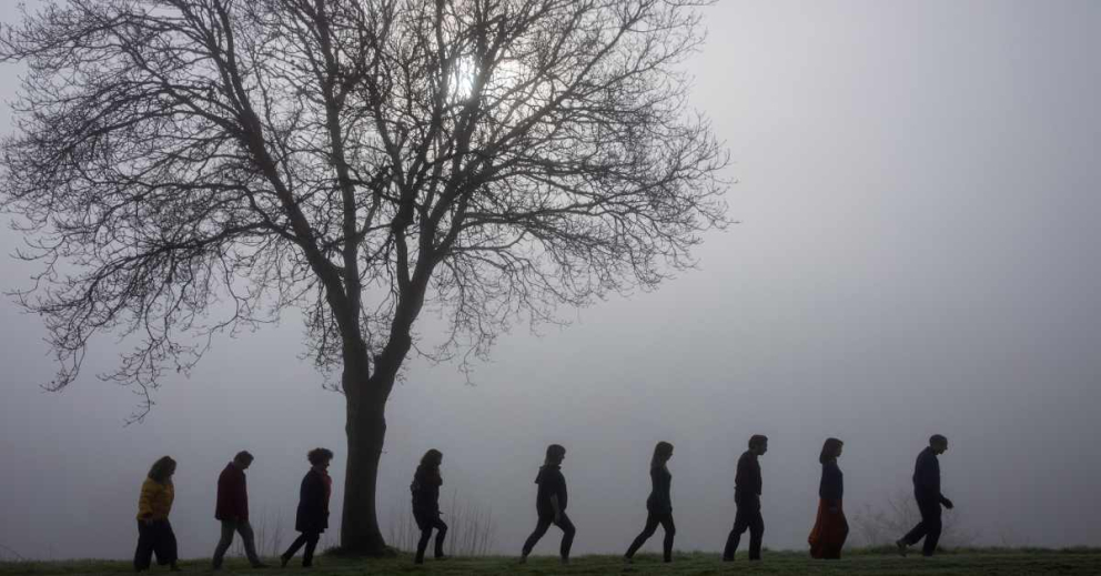 Ramiro leads misty morning mindful walking during a photoshoot at Sharpham House in January 2019